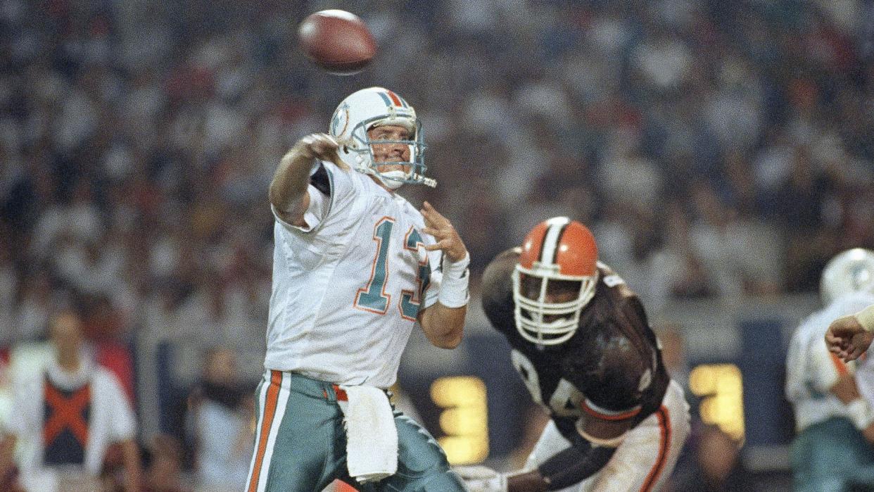 Mandatory Credit: Photo by Jeff Glidden/AP/Shutterstock (6546155a)Dan Marino Miami Dolphin quarterback Dan Marino passes for 16 of his 322 yards against the Cleveland Browns in Cleveland, OhioDan Marino Miami Dolphins 1992, Cleveland, USA.