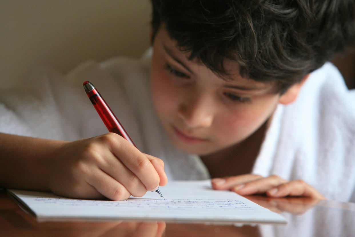 Cursive writing is returning to Ontario elementary schools in September. (Photo via Getty Images)