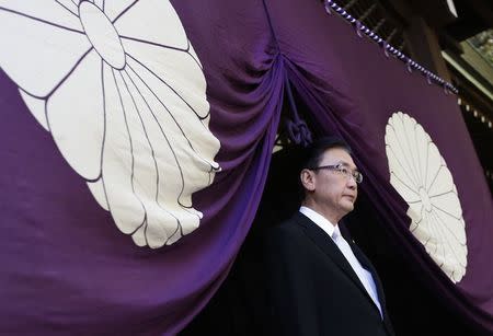 Japan's former minister-in-charge of the abduction issue and former head of the National Public Safety Commission Keiji Furuya, leaves the Yasukuni Shrine after he offered prayers to war dead during an annual autumn festival at the shrine in Tokyo October 17, 2014. REUTERS/Issei Kato