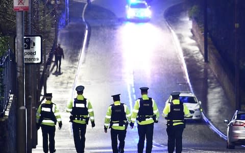 Police check the perimeter of The Greenvale Hotel in Cookstown, County Tyrone, where two young people have died and others have been injured - Credit: Alan Lewis