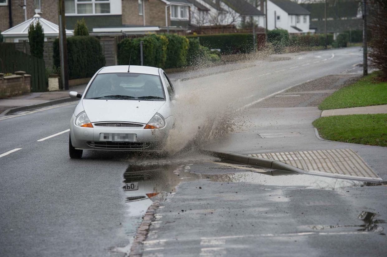 The car (not pictured) splashed a mother and her two children (SWNS)