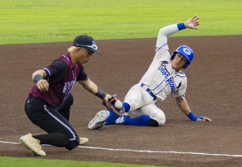 Talan Ball of the Georgetown Eagles slides safe into third base during a playoff game last season at the Georgetown ISD Athletic Complex. Ball had a double against Elgin in a 3-1 win. Georgetown, which swept the series, is undefeated in District 23-5A play.