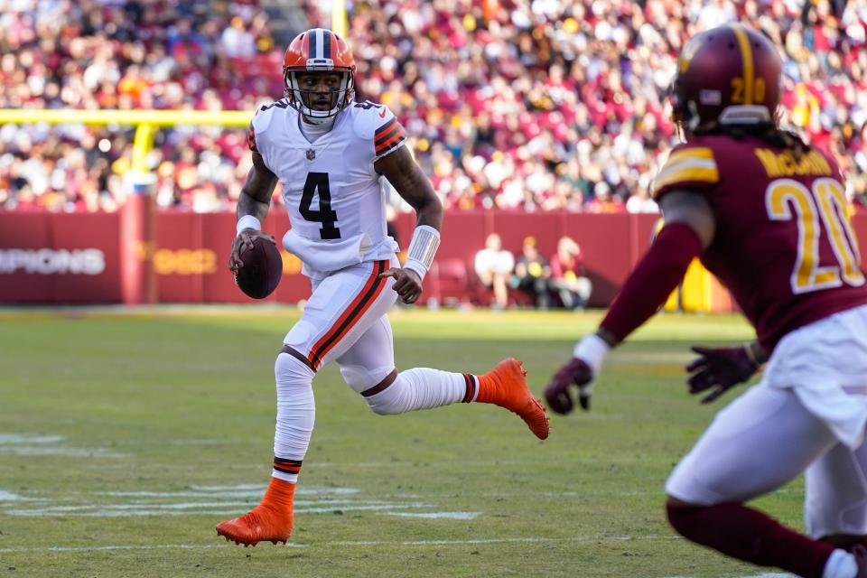 Cleveland Browns quarterback Deshaun Watson (4) scrambles out of the pocket during the first half of an NFL football game against the Washington Commanders, Sunday, Jan. 1, 2023, in Landover, Md. (AP Photo/Patrick Semansky)