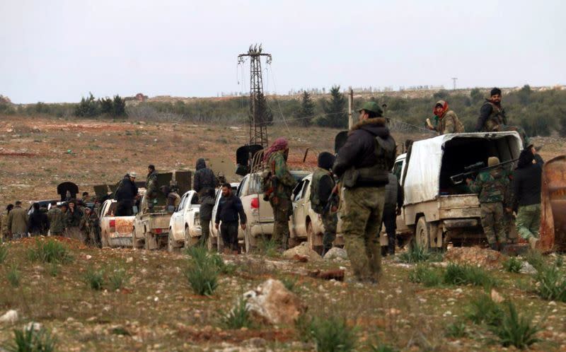 Syrian army soldiers are pictured in western Aleppo province