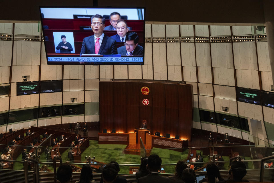 Hong Kong's Finance Secretary Paul Chan delivers the annual budget address at the Legislative Council in Hong Kong, Wednesday, Feb. 28, 2024. (AP Photo/Louise Delmotte)