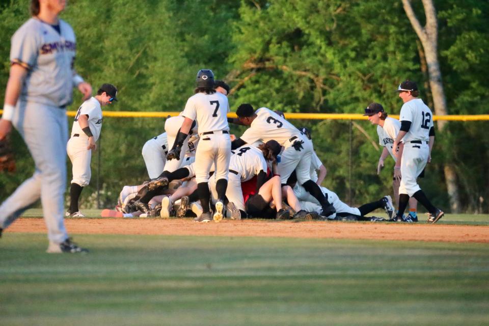 Stewarts Creek players celebrate a walk-off win over Smyrna during Monday's 8-4A tournament championship game.