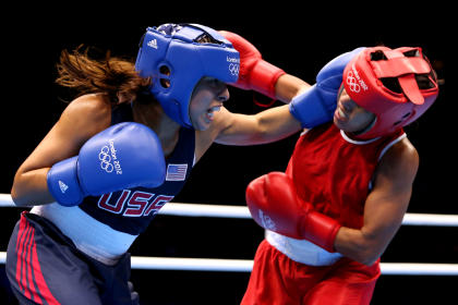 Marlen Esparza (Blue) competes against Karlha Magliocco (Red) (Getty Images)