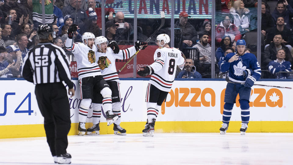 Chicago Blackhawks forward Dominik Kubalik celebrates with teammates after putting on a masterful performance against the Toronto Maple Leafs. (Nick Turchiaro-USA TODAY Sports)