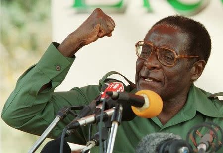 Zimbabwean President Robert Mugabe speaks at an election rally in Bindura, 80 Km's north of the capital, April 7. Mugabe vowed to fight the country's white farmers for access to their land and accused the farmers of bankrolling the new opposition party the Movement for Democratic Change (MDC). PP04020110 HB