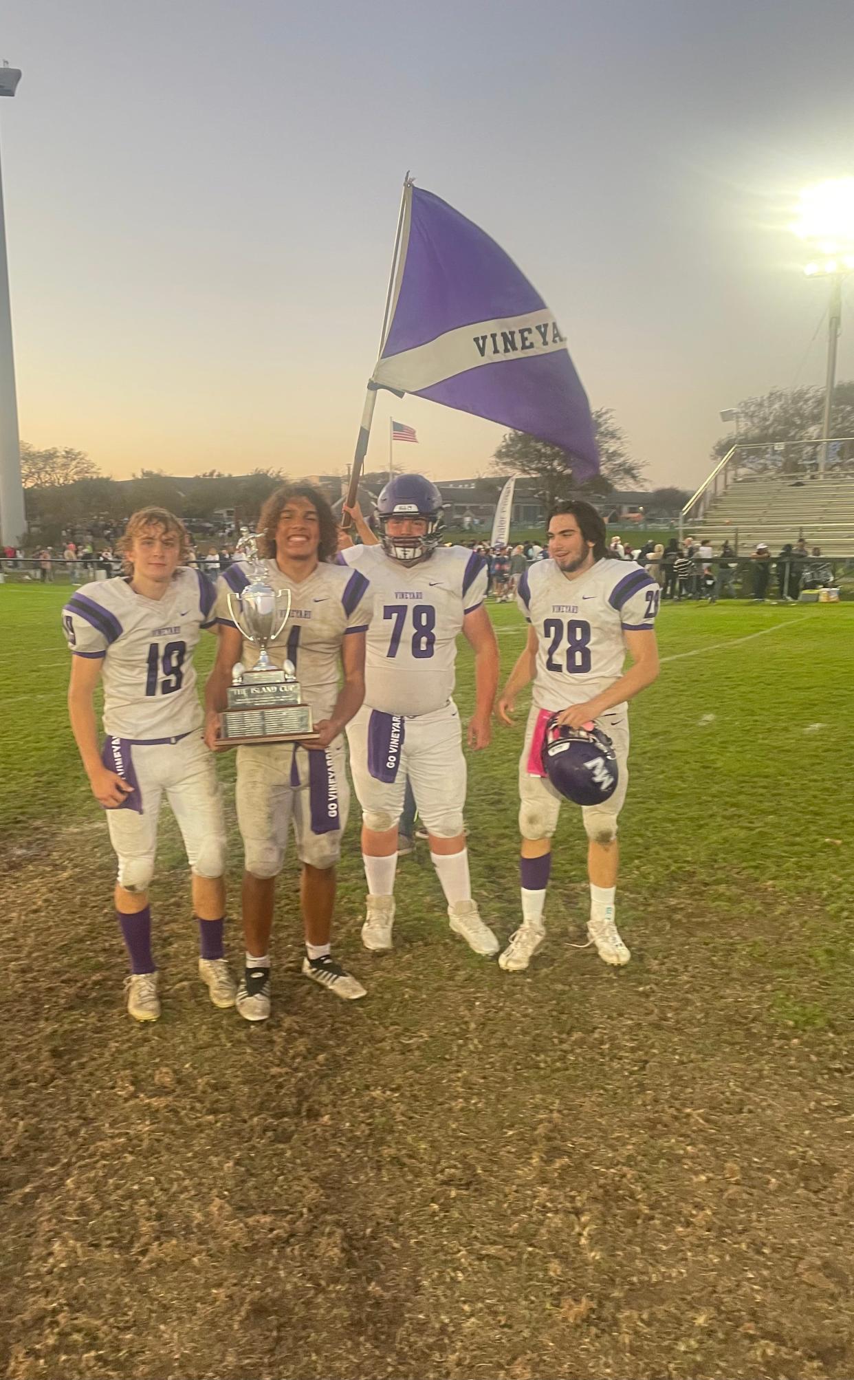 From Left to Right: Aiden Conley, Guilherme Oliveira, Brody Royal, and Gerry Kane all pose with the Island Cup Trophy