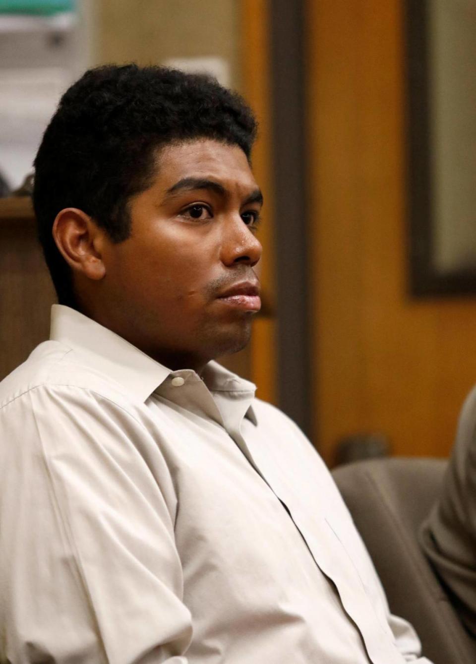 Daniel Angel Saligan Patricio, 24, listens in court on March 1, 2023. He is charged with vehicular manslaughter in the deaths of Matthew Chachere, 39, and Jennifer Besser, 36, on Nov. 21, 2022.