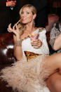 Heidi Klum chows down on some after-party Fat Burger fries. No awards-show diet here!