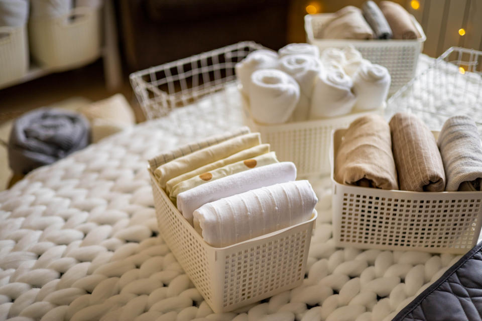 Folded fitted sheets in bins