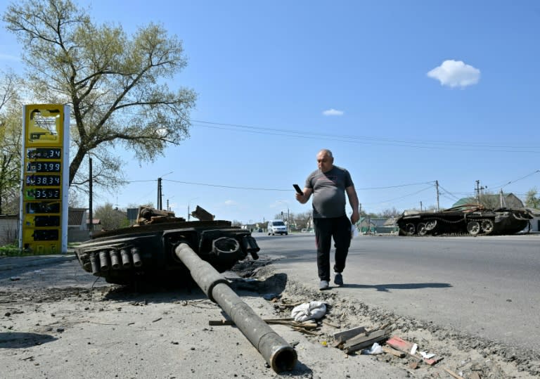The turret from the destroyed tank marks the closest point the Russians came to invading Kyiv from the northeast (AFP/Sergei SUPINSKY)