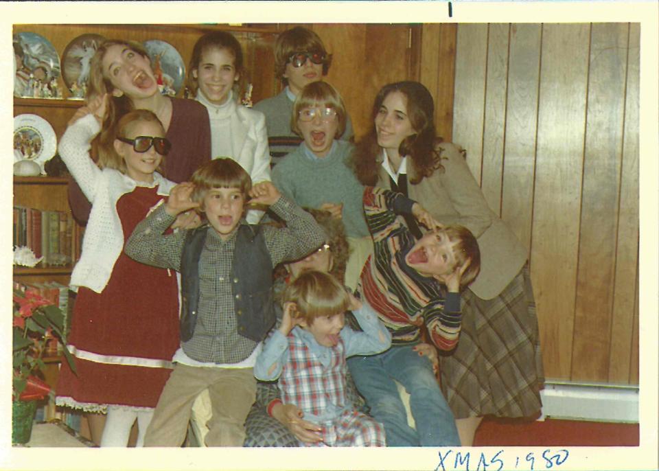 Carolyn (top left) and her sisters with their Bessette cousins, Christmas 1980. 