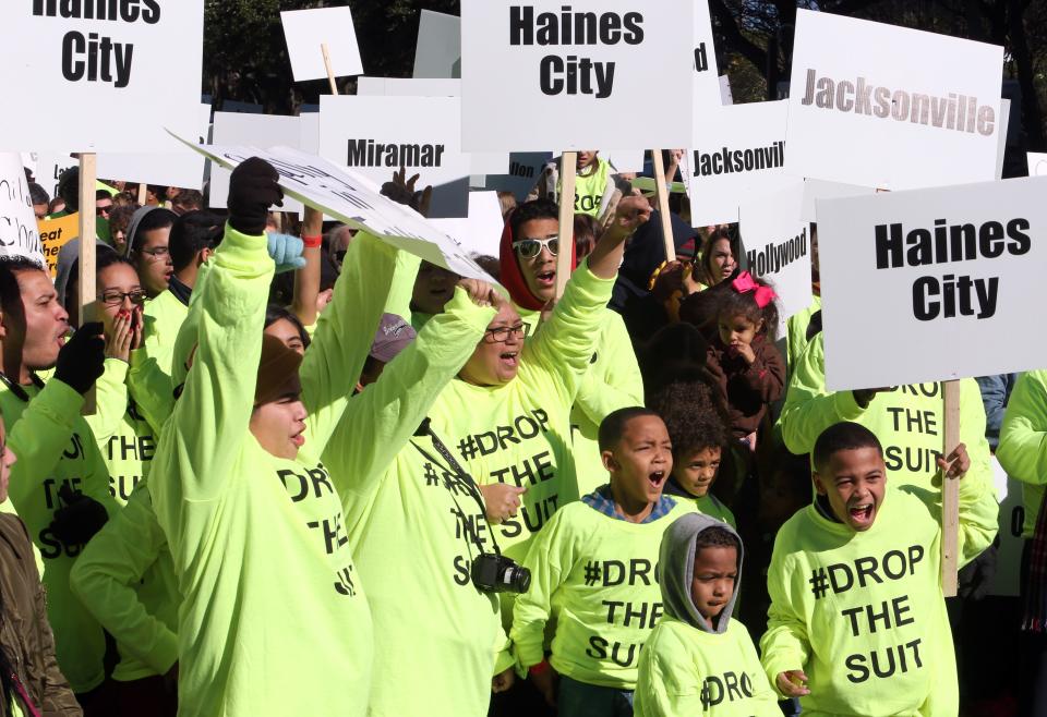 Demonstrators shout out at the Florida Capitol as they rally in support of the school voucher program in 2016. A Florida Senate panel on Thursday advanced a bill that would expand the state's voucher program.