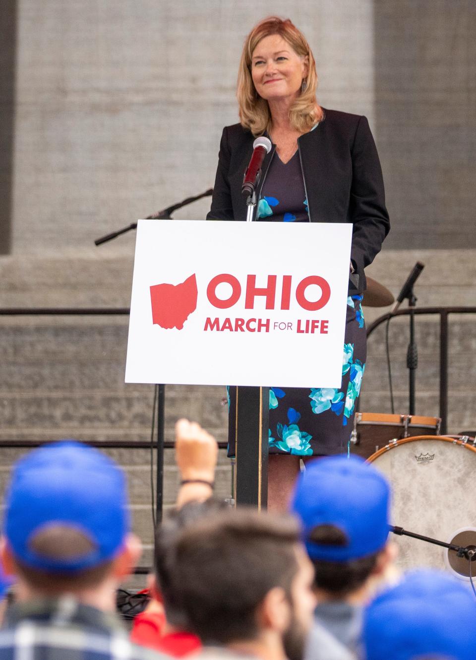 Jeanne Mancici, president of March for Life, speaks during a gathering on the Ohio Statehouse lawn before the Ohio March for Life on High Street.