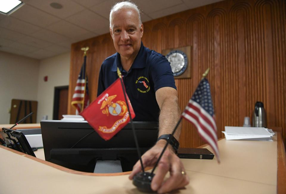 The honorable Judge Robert Belanger, of the 19th Judicial Circuit Court, collects his personal belongings from his bench inside his courtroom in the St. Lucie County Courthouse on Monday, Nov. 6, 2023, in downtown Fort Pierce. Judge Belanger is retiring after 18 years on the bench and 10 years as a high-profile state prosecutor in Stuart.