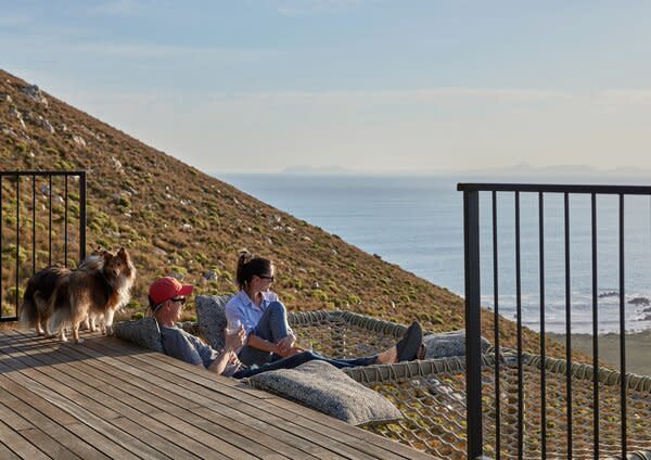 The remote location made construction a challenge. Horne ended up widening the road to the cabin in order to move the shipping containers up the cliff.