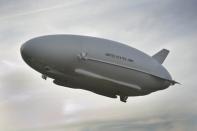 The Long Endurance Multi-Intelligence Vehicle (LEMV) is seen above Joint Base McGuire-Dix-Lakehurst, New Jersey during its first flight, August 7, 2012. The LEMV, like a blimp, is said to be capable of carrying multiple intelligence, surveillance and reconnaissance payloads for more than 21 days at altitudes greater than 22,000 feet. REUTERS/U.S. Army Space and Missile Defense Command/Army Forces Strategic Command