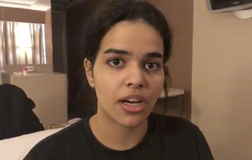 Rahaf Mohammed Alqunan sits barricaded in a hotel room in Bangkok, claiming she is fleeing abuse from her family in Saudi Arabia (Picture: AP)