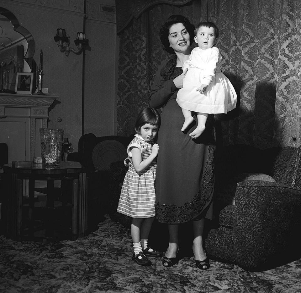 Rita Comer, wife of London gang leader Jack Comer, pictured at home with their two daughters.