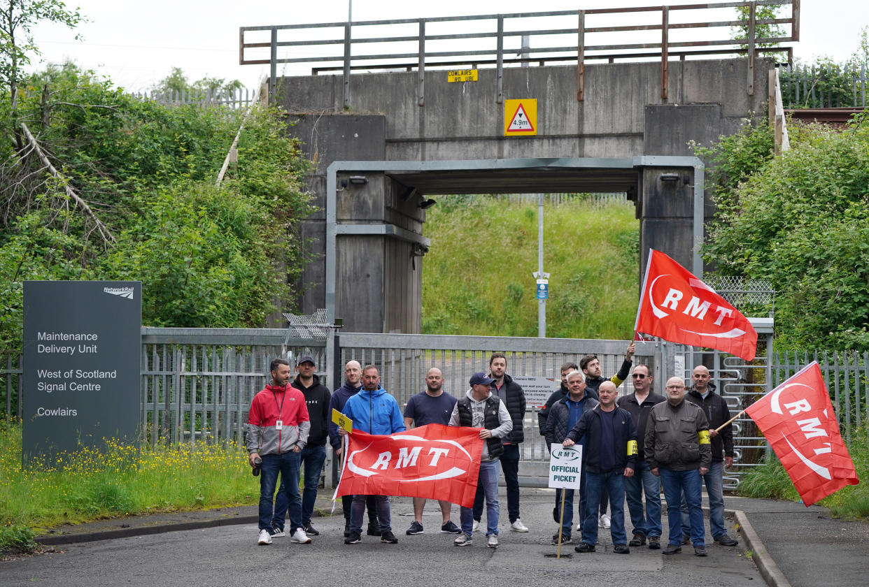 A picket line is seen outside of the Network Rail Maintenance Delivery Unit and West of Scotland Signal Centre in Cowlairs, Glasgow, as members of the Rail, Maritime and Transport union begin their nationwide strike in a bitter dispute over pay, jobs and conditions. Picture date: Tuesday June 21, 2022.