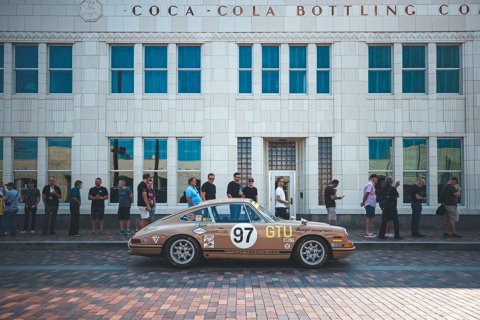 <p>The paint colors at Luftgekühlt shows do not disappoint. Like the Sand Beige on this 1967 911. The car was purchased new and raced by Hans Niederer at a six-hour endurance race at Watkins Glen and again at the Pocono 500 Miles. The original engine has been stored and replaced by a custom-built 2.0-liter with stronger components. It's an incredible vestige of 1960s road racing. Plus, it looks a helluva lot cooler than today's Honda CR-V and Jeep Gladiator with similar paint.</p>