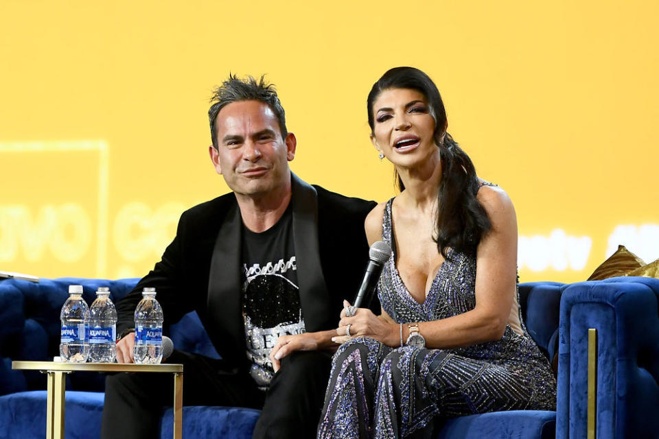 Luis Ruelas and Teresa Giudice on stage at BravoCon 2023