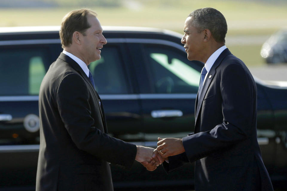 FILE - In this Sept. 4, 2013, file photo President Barack Obama, right, is greeted by U.S. Ambassador Mark Brzezinski, left, upon his arrival at Stockholm-Arlanda International Airport in Stockholm, Sweden. President Joe Biden has nominated Brzezinski, an Obama-era diplomat with deep ties to Poland, to serve as his ambassador to Warsaw. (AP Photo/Pablo Martinez Monsivais, File)