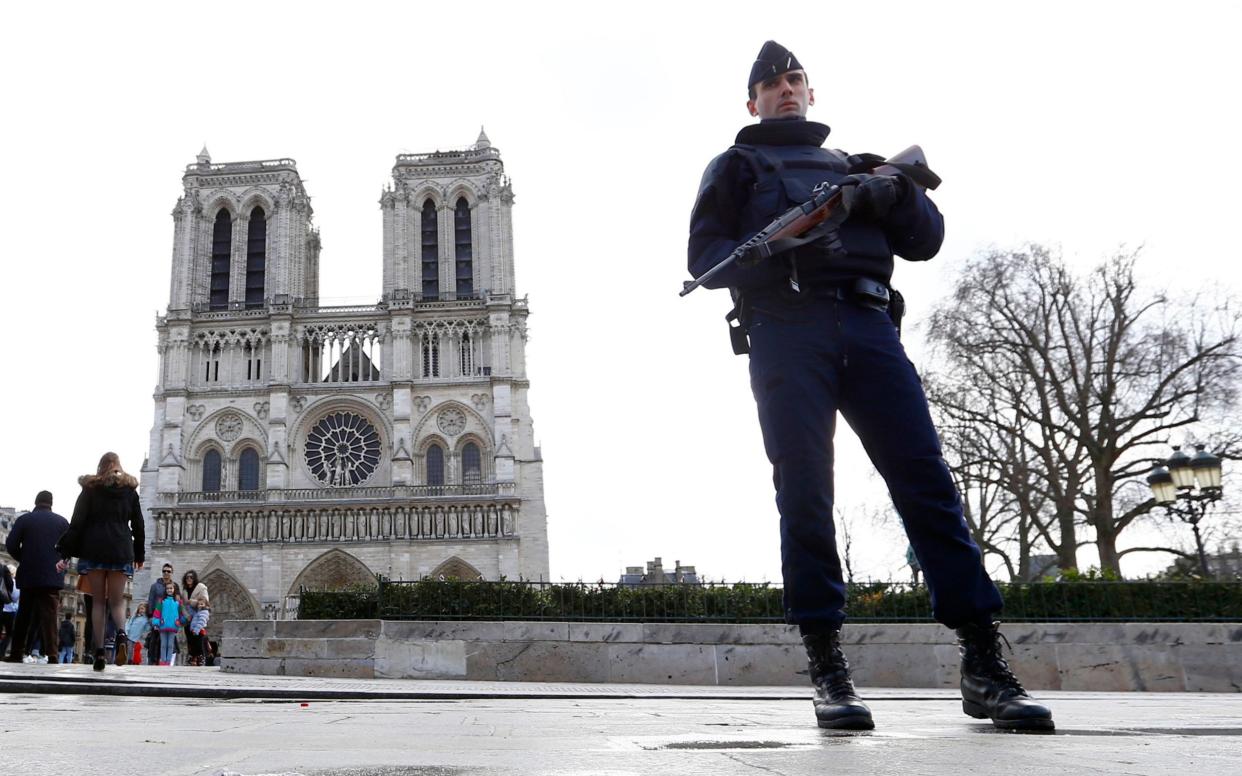 Before it was ravaged by fire, Notre Dame Cathedral was the target of a bungled terrorist plot by two French women who pledged allegiance to the Islamic State group. - AP