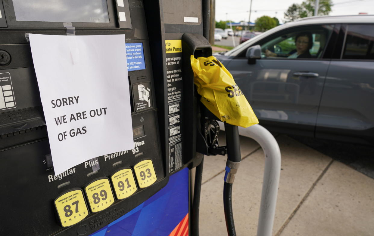 A driver looks at a closed gas pump as stations from Florida to Virginia began running dry and prices at the pump rose, as the shutdown of the Colonial Pipeline by hackers sparked buying panic by motorists, in Falls Church, Virginia, U.S., May 12, 2021. (Kevin Lamarque/Reuters)