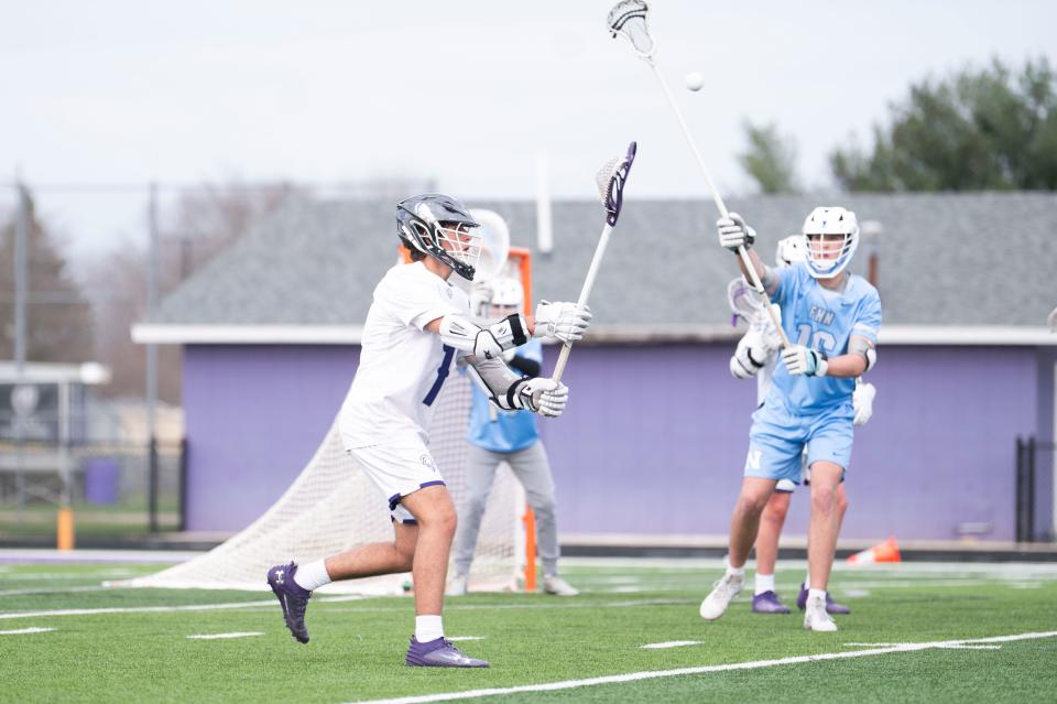 Lakeview senior Dieter Bloch passes the ball during a game against Forest Hills Northern at Lakeview High School on Wednesday, April 11, 2024.