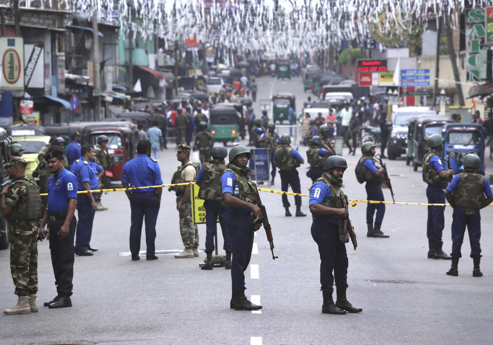 Sri Lankan Naval soldiers stand guard as authorities started clearing the debris from inside of the damaged St. Anthony's Church after it was targeted in a series of Islamic State-claimed suicide bombings that killed hundreds of people during Easter Sunday, in Colombo, Saturday, April 27, 2019. Sri Lankan security forces have found 15 bodies, including six children, after militants linked to the Easter bombings set off explosives during a raid on their house in the country's east. (AP Photo/Manish Swarup)