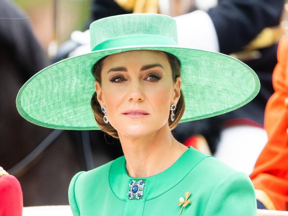 Kate Middleton in a green hat and green dress at Trooping the Colour 2023.