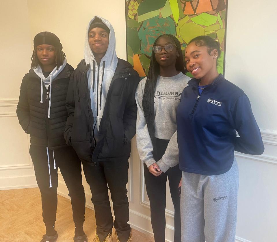 From left, students Aniya Simmons, Isaiah Langston, Tori Battle and Amali Holloway pose in the Community Education Building, where they attend school in Wilmington, Delaware, on Jan. 30, 2024.