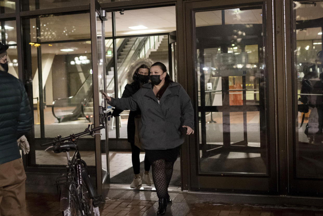 Katie Bryant, right, the mother of Daunte Wright, exits the Hennepin County Government Center on Wednesday, Dec. 22, 2021, in Minneapolis. Former Minneapolis police officer Kim Potter, who is white, is charged with first- and second-degree manslaughter in the shooting of Wright, a Black motorist, in the suburb of Brooklyn Center. Potter has said she meant to use her Taser – but grabbed her handgun instead – after Wright tried to drive away as officers were trying to arrest him. (AP Photo/Christian Monterrosa)