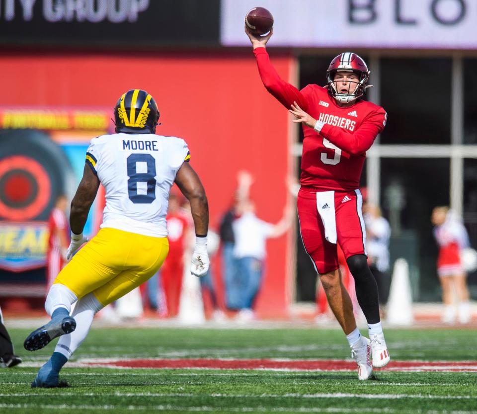 Indiana's Connor Bazelak (9) throws during the Indiana versus Michigan football game at Memorial Stadium on Saturday, Oct. 8, 2022.
