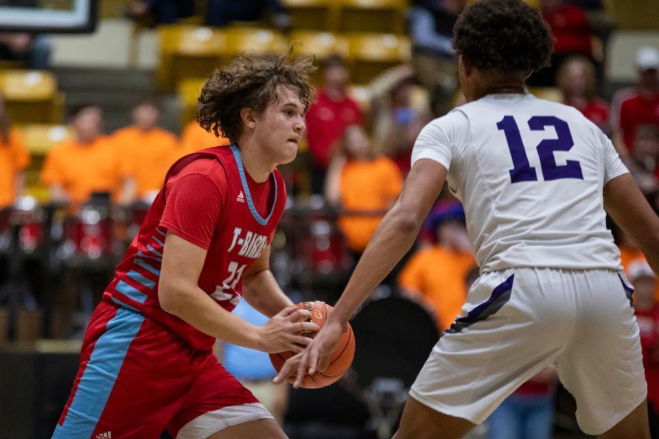 Shawnee Heights' Jaret Sanchez looks to pass against Piper in the quarterfinals at Emporia on Wednesday, March 6, 2024.