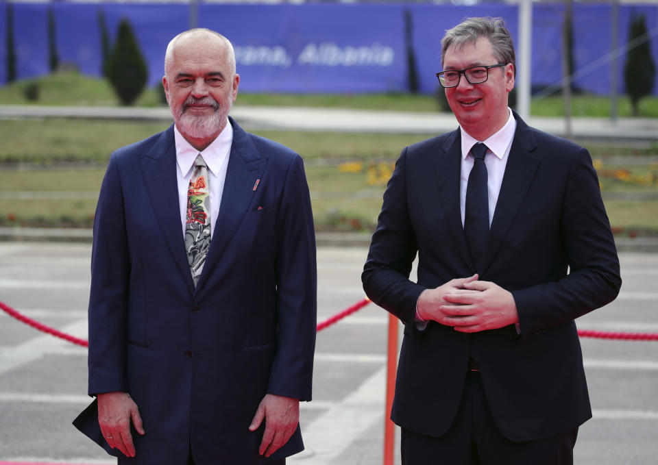 Albania's Prime Minister Edi Rama, left, pose with Serbia's President Aleksandar Vucic before a summit in Tirana, Albania, Thursday, Feb. 29, 2024. The leaders of Western Balkan countries met Thursday in another joint push to use the European Union's financial support plan of six billion euros (about $6.5 billion) hoping it will speed up its membership in the bloc. (AP Photo/Armando Babani)
