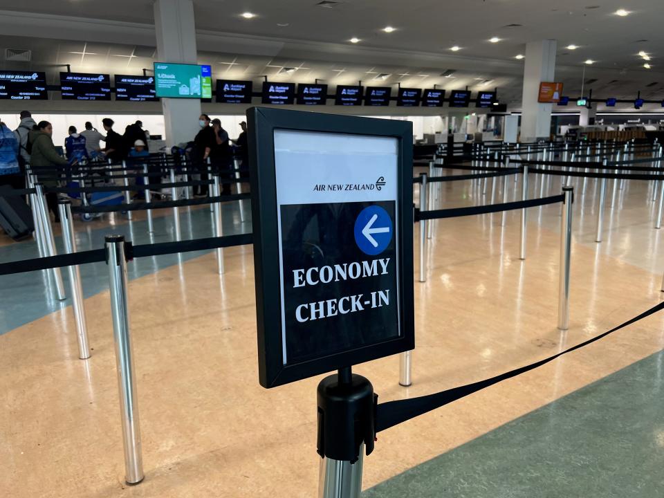 Economy sign at check-in.