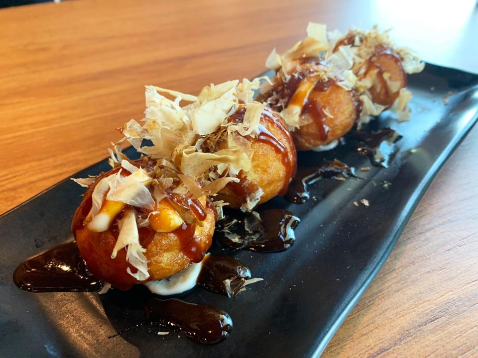 The takoyaki is a fun octopus street snack from Japan and executed perfectly here.