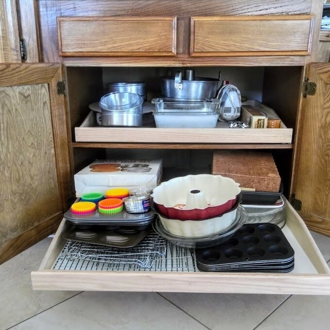 reviewer showing the shelves in a pantry