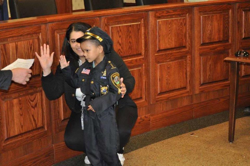 <p>Tarrytown PD/X</p> Ethan Hierro taking the police oath to become with his mom Isabel Estevez by his side in Tarrytown, N.Y., on Feb. 20, 2024.