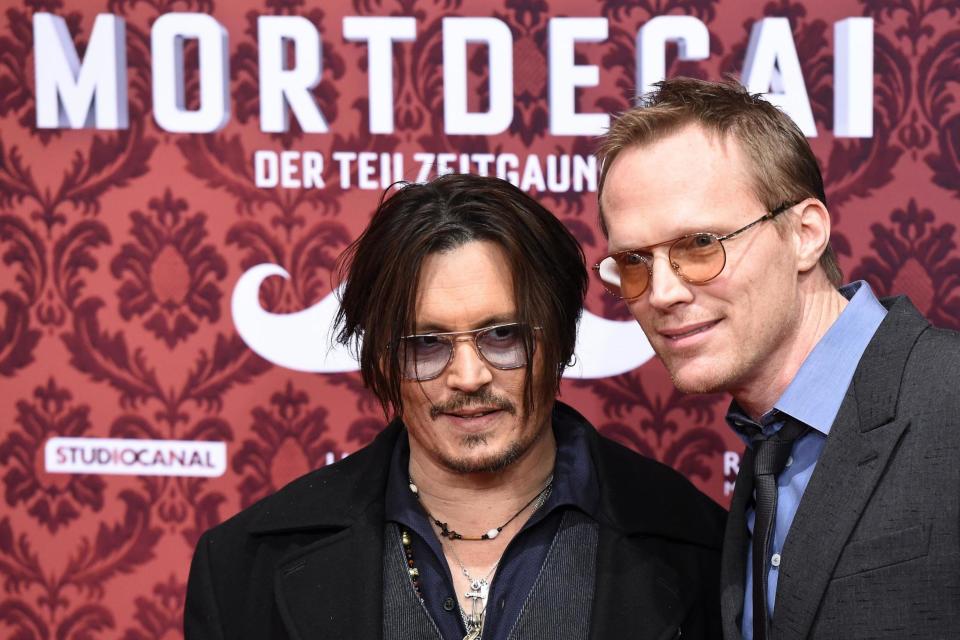 Johnny Depp and Paul Bettany in 2015 (AFP via Getty Images)