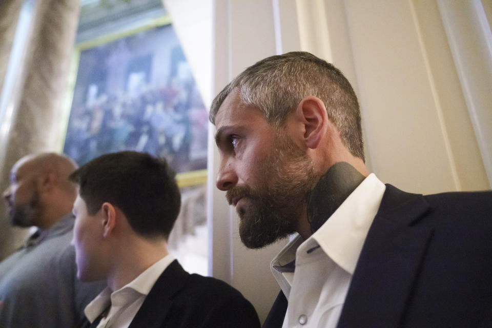 Michael Fanone, a Washington Metropolitan Police Department officer who was also attacked and beaten during the Jan. 6, attack on the Capitol, waits as Harry Dunn, left, a U.S. Capitol Police officer who also faced the rioters speaks to reporters as they leave a meeting with House Minority Leader Kevin McCarthy, R-Calif., at the Capitol in Washington, Friday, June 25, 2021. House Speaker Nancy Pelosi announced Thursday she's creating a special committee to investigate the attack by a mob of Trump supporters who sought to interrupt the certification of Joe Biden's presidential election victory. (AP Photo/J. Scott Applewhite)