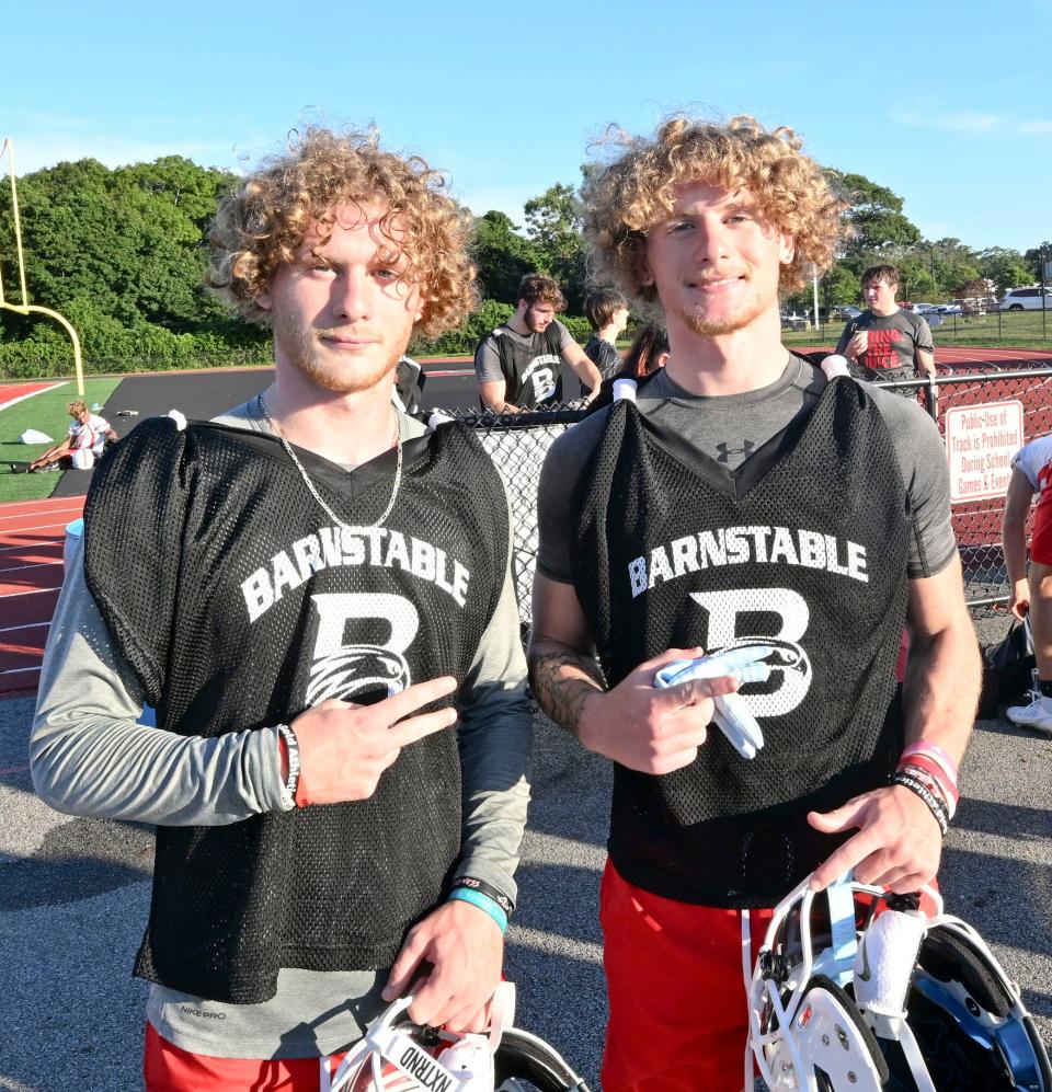 Eric (left) and Andrew Lovell Barnstable high football players.