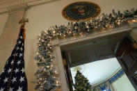 <p>The official White House Christmas tree stands in the Blue Room at the White House during a press preview of the 2017 holiday decorations November 27, 2017 in Washington, DC. The theme of the White House holiday decorations this year is “Time-Honored Traditions.” (Photo: Alex Wong/Getty Images) </p>