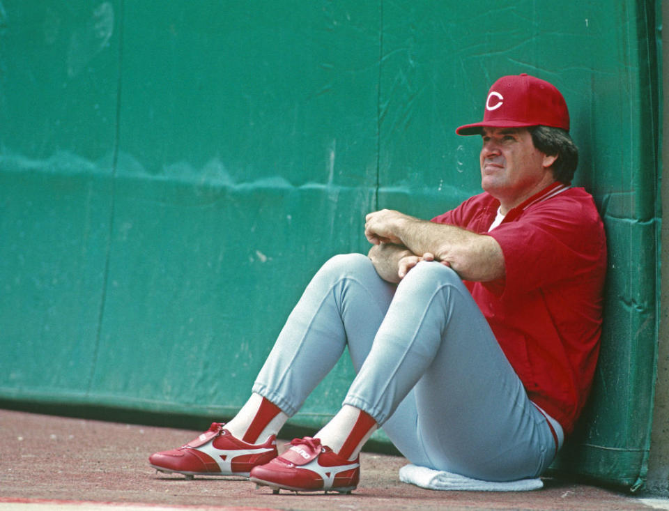 Pete Rose of the Cincinnati Reds looks on from near the dugout during a game against the Pittsburgh Pirates at Three Rivers Stadium in Pittsburgh, Pa., in 1987.<span class="copyright">George Gojkovich—Getty Images</span>