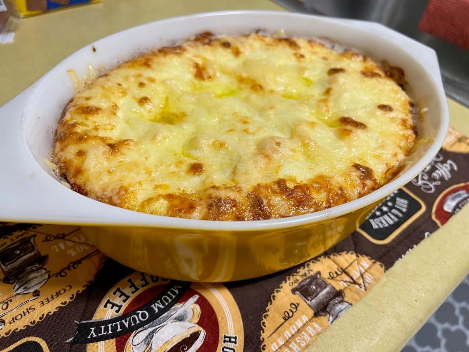This gratin of potatoes, onions and sausage is hearty and filled with every-day ingredients. Julia Child is known for cooking with plenty of cream and butter and this dish doesn't disappoint.